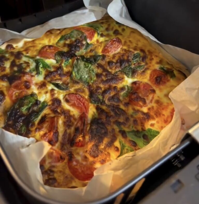 assembled tortilla omelette with tomato basil and cheese before air frying