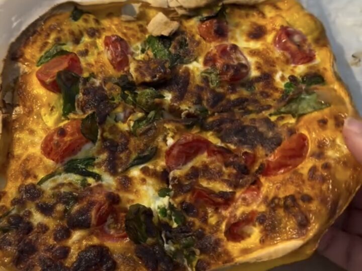 cooked air fryer tortilla omelette with crispy edges and melted cheese