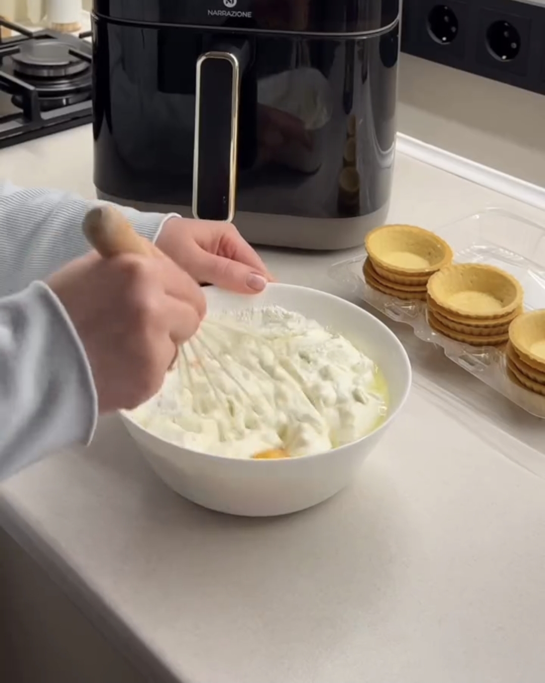 mixing the raspberry casserole ingridients together