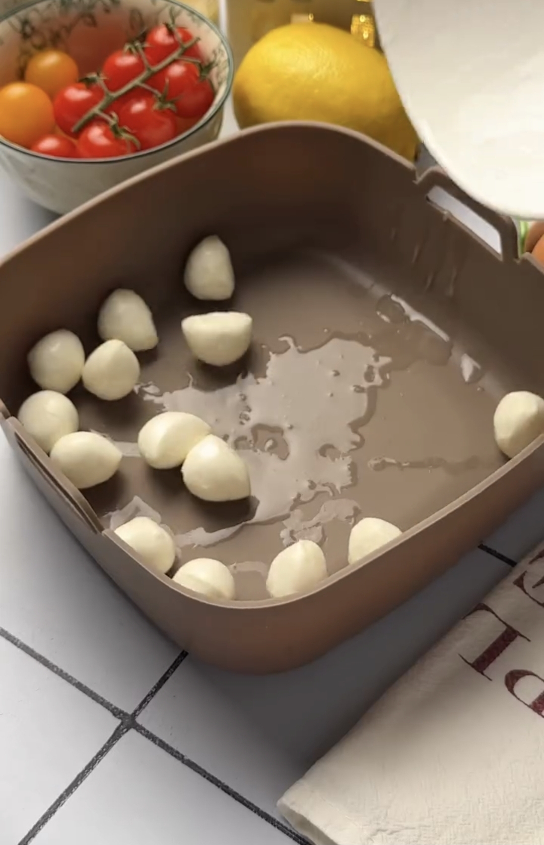 10-minute air fryer breakfast white mozzarella cheese rounds placed on top of eggs