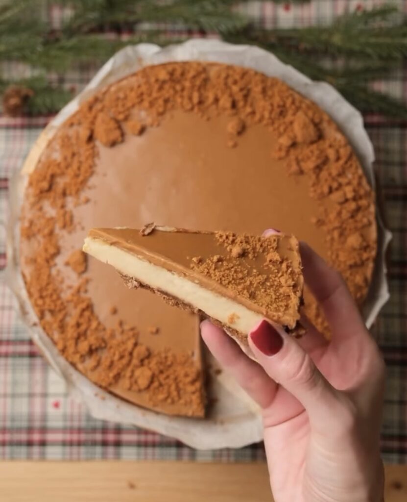 finished biscoff cheesecake with glossy topping ready to serve