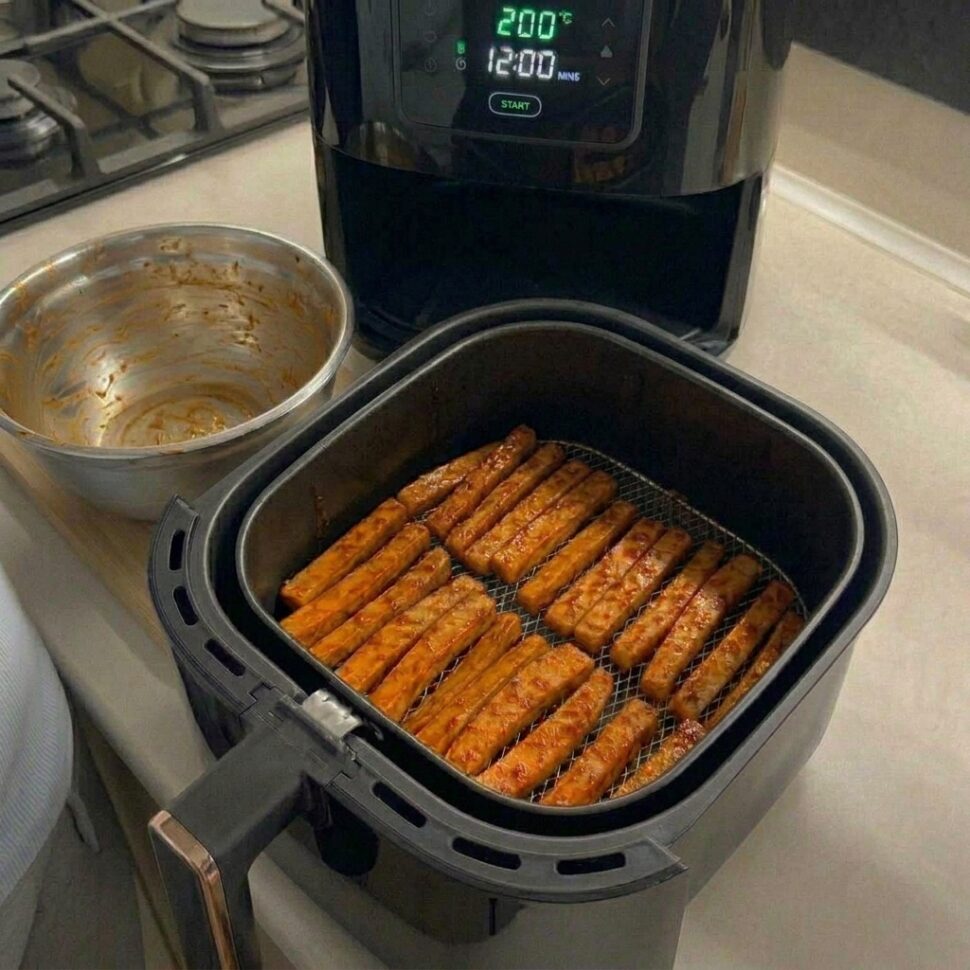 Golden crispy carrot fries served hot with a lightly spiced coating and tender center