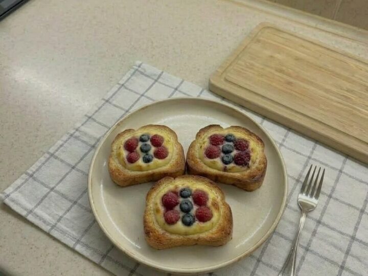 Yogurt toast cooking in air fryer until custard is set and edges are golden