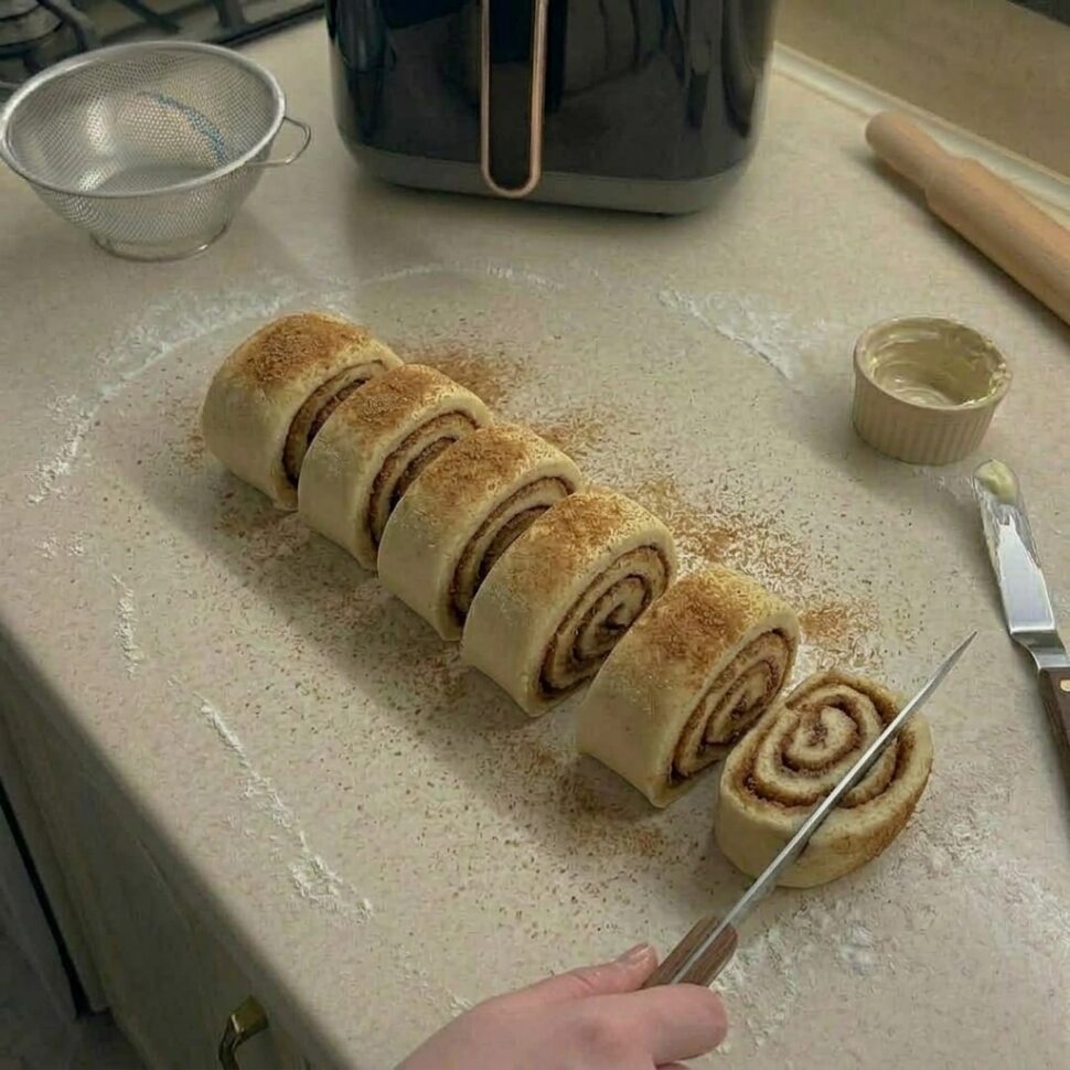 Fresh cinnamon rolls served warm with soft layers and caramelized filling