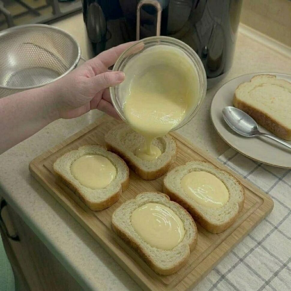 Bread slices pressed in the center to create a well for custard filling